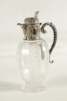 Lot 308 - A VICTORIAN SILVER AND CUT GLASS CLARET JUG