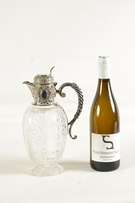 Lot 308 - A VICTORIAN SILVER AND CUT GLASS CLARET JUG