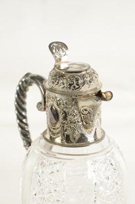 Lot 308 - A VICTORIAN SILVER AND CUT GLASS CLARET JUG