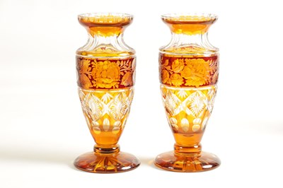 Lot 13 - A PAIR OF BOHEMIAN RED AND AMBER FLASHED CUT GLASS VASES