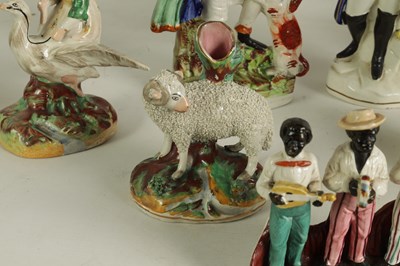 Lot 76 - A GROUP OF 19TH CENTURY STAFFORDSHIRE FIGURES