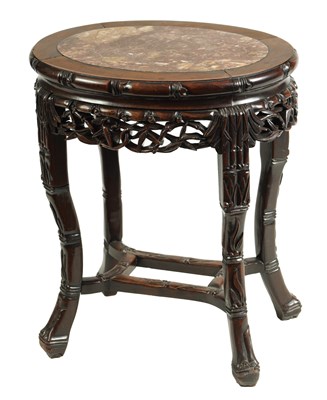 Lot 168 - A 19TH CENTURY OVAL CARVED HARDWOOD CHINESE TABLE