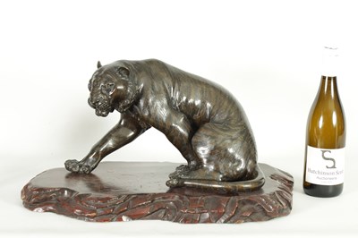 Lot 280 - AN UNUSUAL JAPANESE MEIJI PERIOD BRONZE SCULPTURE OF A SEATED TIGER