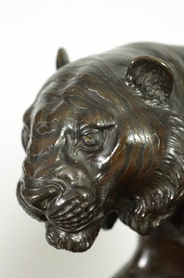 Lot 280 - AN UNUSUAL JAPANESE MEIJI PERIOD BRONZE SCULPTURE OF A SEATED TIGER