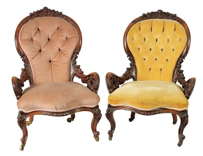 Lot 1329 - A PAIR OF VICTORIAN CARVED WALNUT DRAWING ROOM BUTTON-UPHOLSTERED CHAIRS