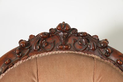 Lot 1329 - A PAIR OF VICTORIAN CARVED WALNUT DRAWING ROOM BUTTON-UPHOLSTERED CHAIRS
