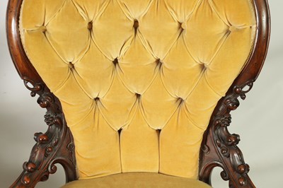 Lot 1329 - A PAIR OF VICTORIAN CARVED WALNUT DRAWING ROOM BUTTON-UPHOLSTERED CHAIRS