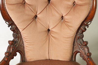 Lot 1329 - A PAIR OF VICTORIAN CARVED WALNUT DRAWING ROOM BUTTON-UPHOLSTERED CHAIRS