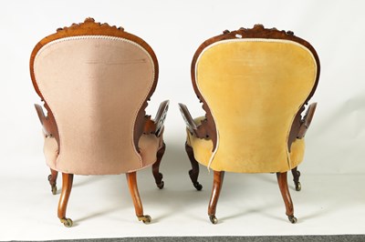 Lot 1329 - A PAIR OF VICTORIAN CARVED WALNUT DRAWING ROOM BUTTON-UPHOLSTERED CHAIRS