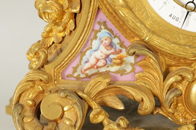 Lot 1238 - A LATE 19TH CENTURY FRENCH ORMOLU AND PORCELAIN PANELLED CALENDAR CLOCK