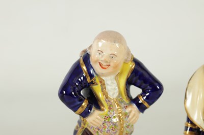 Lot 170 - A PAIR OF EARLY 19TH CENTURY BLOOR DERBY STANDING FIGURES DEPICTING LAUGHING AND CRYING PHILOSOPHERS