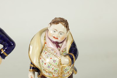 Lot 170 - A PAIR OF EARLY 19TH CENTURY BLOOR DERBY STANDING FIGURES DEPICTING LAUGHING AND CRYING PHILOSOPHERS