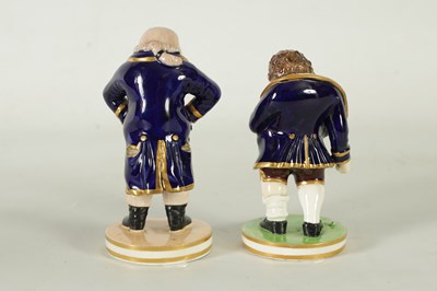 Lot 170 - A PAIR OF EARLY 19TH CENTURY BLOOR DERBY STANDING FIGURES DEPICTING LAUGHING AND CRYING PHILOSOPHERS