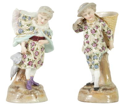 Lot 138 - A PAIR OF EARLY 20TH CENTURY CONTINENTAL PORCELAIN FIGURAL MATCH HOLDERS