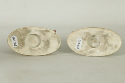 Lot 48 - A RARE PAIR OF EARLY 19TH CENTURY MINTON 'WAR AND PEACE' FIGURINES