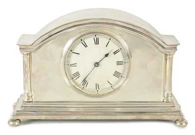 Lot 1183 - AN EDWARDIAN SILVER-PLATED TIMEPIECE MANTEL CLOCK