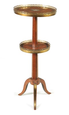 Lot 1450 - AN EARLY 19TH CENTURY FRENCH SATINWOOD AND MAHOGANY CIRCULAR TWO-TIER OCCASIONAL TABLE