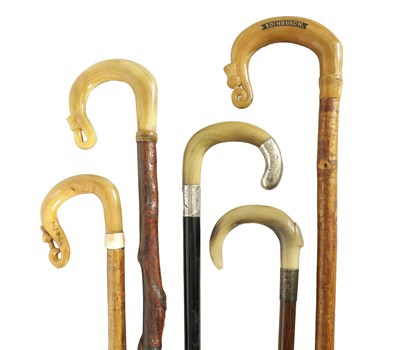 Lot 654 - A COLLECTION OF FIVE WALKING STICKS