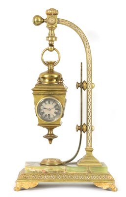 Lot 1268 - AN UNUSUAL LATE 19TH CENTURY FRENCH INDUSTRIAL BRASS AND ONYX NOVELTY MANTEL CLOCK