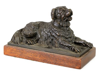 Lot 951 - A 19TH CENTURY BRONZE SCULPTURE OF A RECUMBENT DOG