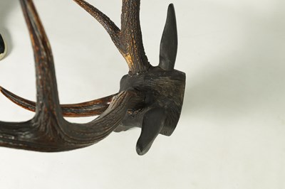 Lot 923 - A LATE 19TH CENTURY CARVED WOODEN SAMBA DEERS HEAD