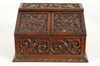 Lot 917 - A LATE 19TH CENTURY CARVED ROSEWOOD STATIONERY BOX