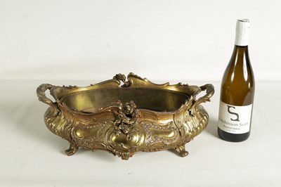 Lot 609 - A 19TH CENTURY FRENCH CAST GILT METAL RECOCO STYLE OVAL TWO-HANDLED SHALLOW JARDINERE AND LINER