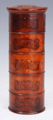 Lot 156 - A 19th CENTURY TREEN SPICE RACK  labelled MACE,...