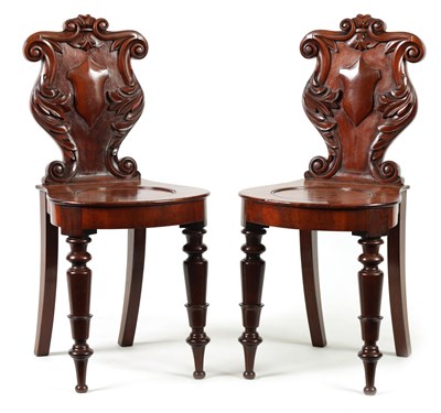 Lot 1448 - A PAIR OF WILLIAM IV MAHOGANY HALL CHAIRS