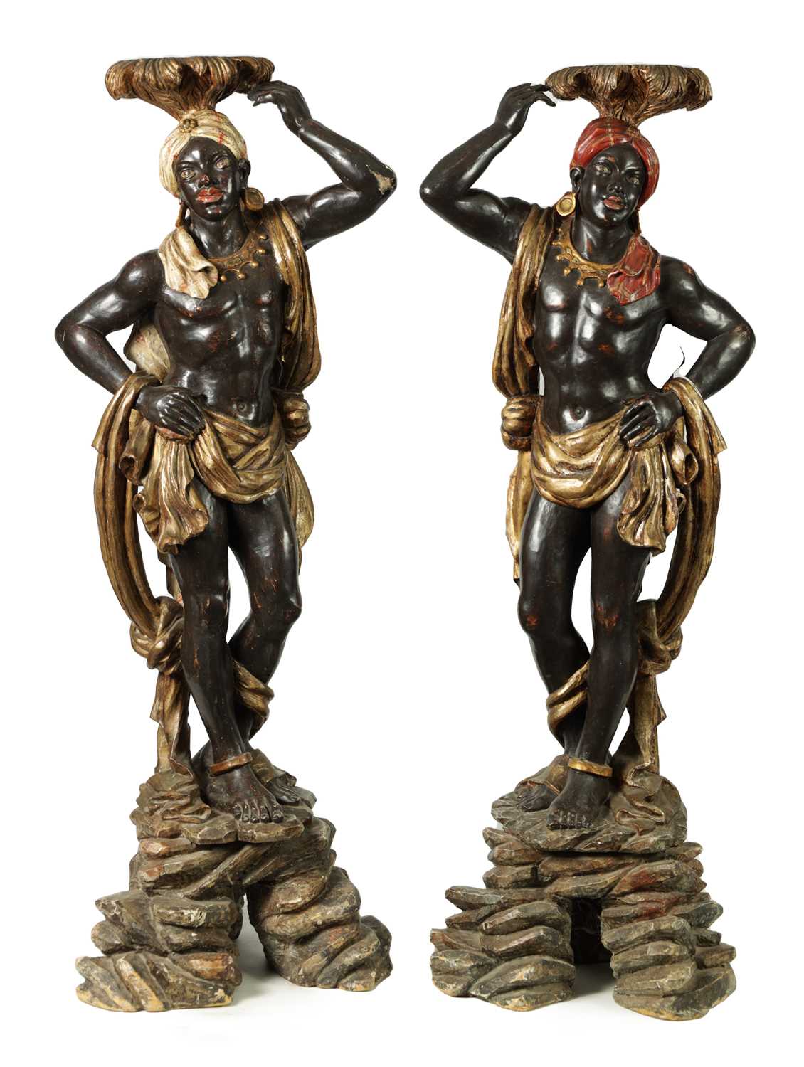 Lot 1451 - A PAIR OF 19TH CENTURY CARVED POLYCHROME DECORATED BLACKAMOORS