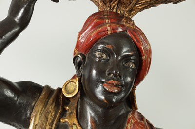 Lot 1451 - A PAIR OF 19TH CENTURY CARVED POLYCHROME DECORATED BLACKAMOORS