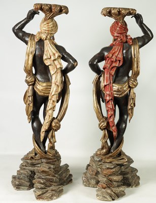 Lot 1451 - A PAIR OF 19TH CENTURY CARVED POLYCHROME DECORATED BLACKAMOORS