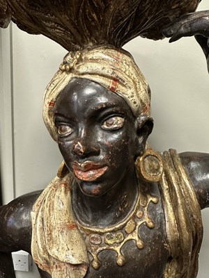 Lot 1451 - A PAIR OF 19TH CENTURY CARVED POLYCHROME DECORATED BLACKAMOORS