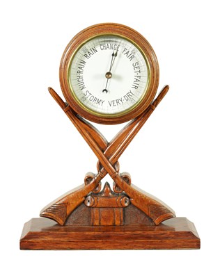 Lot 1208 - A LATE 19TH CENTURY OAK ANEROID DESK TOP BAROMETER