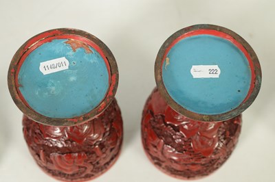 Lot 231 - A PAIR OF 18TH/19TH CENTURY CHINESE CINNABAR LACQUER URN-SHAPED LIDDED VASES