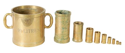 Lot 725 - W & J. AVERY LTD, BIRMINGHAM. A PART SET OF TEN GRADUATED BELL METAL MEASURES