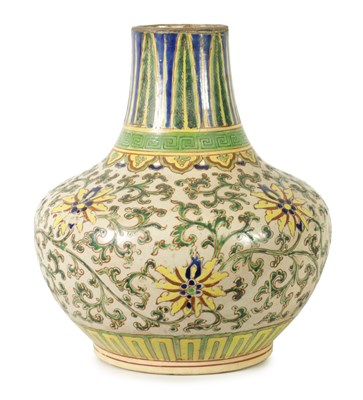 Lot 234 - A 19TH CENTURY ISNIC BULBOUS VASE