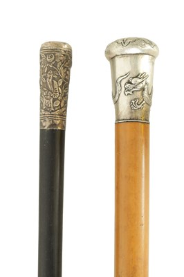 Lot 677 - TWO LATE 19TH CENTURY ORIENTAL SILVER MOUNTED WALKING CANES