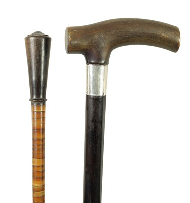 Lot 682 - A LATE 19TH CENTURY EBONISED HORN HANDLED SILVER MOUNTED WALKING STICK