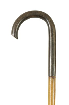 Lot 668 - A 19TH CENTURY RHINOCEROS HORN TAPERING WALKING STICK