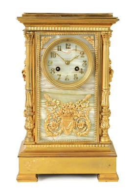Lot 1158 - A 19TH CENTURY FRENCH ORMOLU AND ONYX PANELLED MANTEL CLOCK