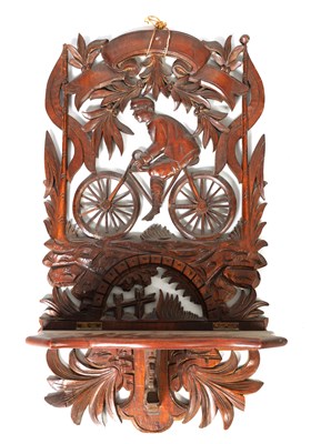 Lot 803 - A LATE 19TH CENTURY BLACK FOREST CARVED BICYCLE WALL BRACKET