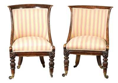 Lot 1361 - A PAIR OF REGENCY SIMULATED ROSEWOOD UPHOLSTERED LIBRARY CHAIRS