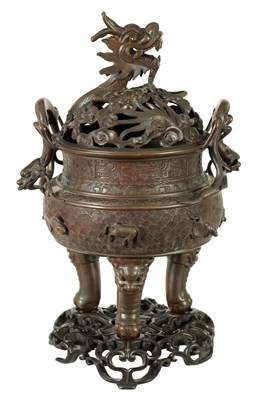 Lot 156 - A 19TH CENTURY CHINESE BRONZE CENSER AND LID MOUNTED ON A HARDWOOD STAND