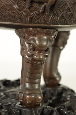 Lot 156 - A 19TH CENTURY CHINESE BRONZE CENSER AND LID MOUNTED ON A HARDWOOD STAND