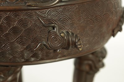 Lot 156 - A 19TH CENTURY CHINESE BRONZE CENSER AND LID MOUNTED ON A HARDWOOD STAND