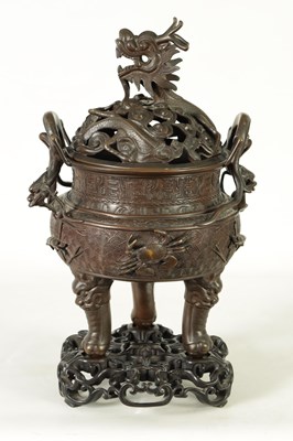 Lot 156 - A 19TH CENTURY CHINESE BRONZE CENSER AND LID MOUNTED ON A HARDWOOD STAND