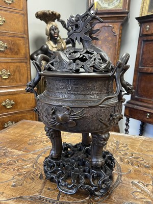 Lot 156 - A 19TH CENTURY CHINESE BRONZE CENSER AND LID MOUNTED ON A HARDWOOD STAND