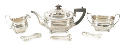 Lot 571 - A GEORGE V THREE-PIECE SILVER TEA SERVICE