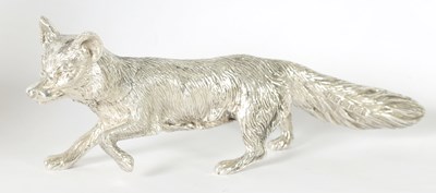 Lot 513 - A SOLID SILVER CAST MODEL OF A PROWLING FOX